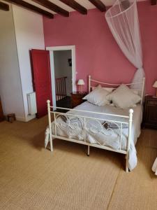 Ένα ή περισσότερα κρεβάτια σε δωμάτιο στο Mimosa