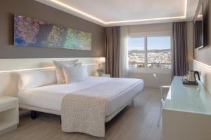 Una cama o camas en una habitación de Calipolis