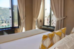 Relais Castello di Morcote客房内的一张或多张床位
