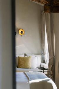 Relais Castello di Morcote客房内的一张或多张床位