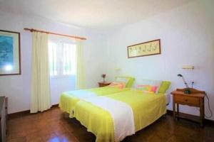 Posteľ alebo postele v izbe v ubytovaní Sa Calma Beach House