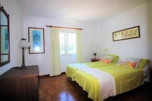 Posteľ alebo postele v izbe v ubytovaní Sa Calma Beach House