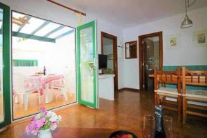 Posteľ alebo postele v izbe v ubytovaní Sa Calma Beach House