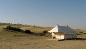 a large tent in the middle of the desert at Killa Bhawan in Jaisalmer