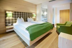 מיטה או מיטות בחדר ב-Hotel Gasthof zur Post