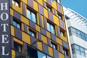 an office building with a colorful facade at Suite Loc Luxury Aparthotel in Casablanca