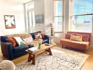 a living room with a couch and a coffee table at 15 Kingsway House in Worthing