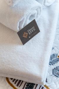 Postel nebo postele na pokoji v ubytování Dimora EFFE - Eco B&B