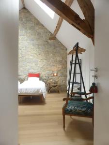 Postel nebo postele na pokoji v ubytování Ferme de la Porte Rouge + 7 fotografií