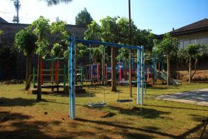 an empty playground in a park with a playground at Grand Nirwana Resort Lembang in Tangkubanperahu