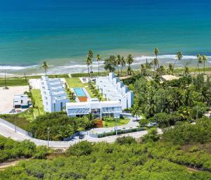 an aerial view of a resort on the beach at B Blue Beachouses in Itacimirim