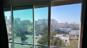 a view of a city from a window at En plein centre-ville. in Casablanca