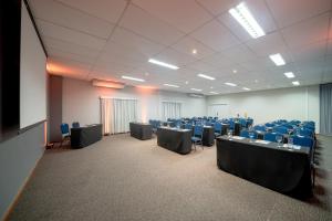 a large room with tables and chairs in it at Beach Park Resort - Oceani in Aquiraz +113 photos