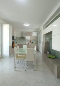 Kuchyň nebo kuchyňský kout v ubytování Terrazza Bianca