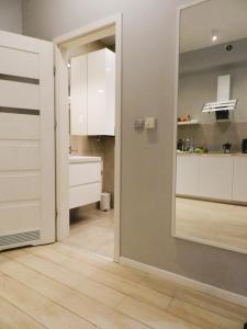 Posteľ alebo postele v izbe v ubytovaní Apartament Donnka