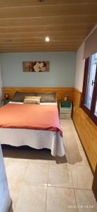 En eller flere senge i et værelse på Villa Anita Piriapolis + 13 billeder