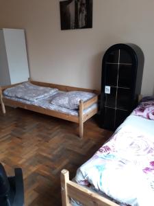 Katil atau katil-katil dalam bilik di Macedonia Home