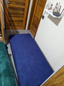 Cama o camas de una habitación en Macadamia Espaço de Festas e hospedagem