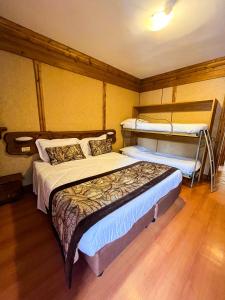 Letto o letti in una camera di Hotel Togo Monte Terminillo