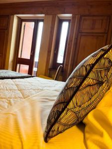 Letto o letti in una camera di Hotel Togo Monte Terminillo