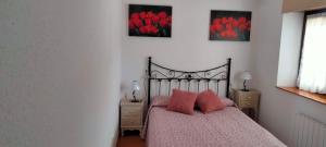 Posteľ alebo postele v izbe v ubytovaní Apartamentos Turísticos el Pontón