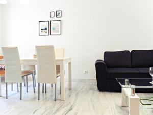 Posedenie v ubytovaní Fabuloso apartamento junto al Soho con parking privado