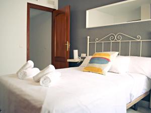 Posteľ alebo postele v izbe v ubytovaní Fabuloso apartamento junto al Soho con parking privado