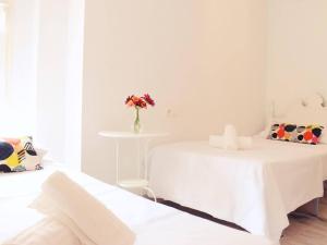 Posteľ alebo postele v izbe v ubytovaní Fabuloso apartamento junto al Soho con parking privado