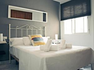 Posteľ alebo postele v izbe v ubytovaní Fabuloso apartamento junto al Soho con parking privado