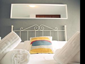 Posteľ alebo postele v izbe v ubytovaní Fabuloso apartamento junto al Soho con parking privado