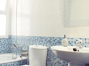 Kúpeľňa v ubytovaní Fabuloso apartamento junto al Soho con parking privado