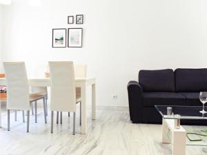 Posedenie v ubytovaní Fabuloso apartamento junto al Soho con parking privado
