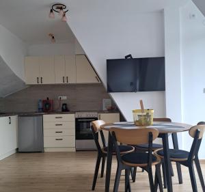 Una cocina o zona de cocina en Apartman Yellow Moon
