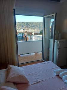 En eller flere senge i et værelse på Tomulić Jasna i Miljenko