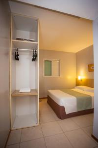 Cama ou camas em um quarto em ibis Styles Belém do Pará mais 37 fotos