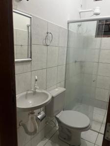 Kylpyhuone majoituspaikassa Apartamento com vista para o mar