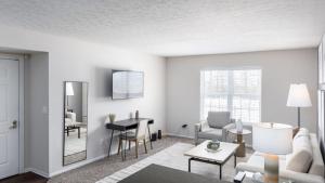 a living room with a couch and a table at Landing Modern Apartment with Amazing Amenities (ID9224X56) in Lewis Center