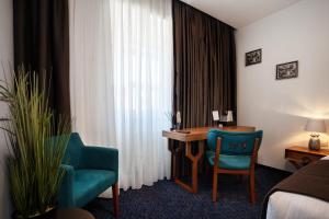 Χώρος καθιστικού στο Hotel Šumava