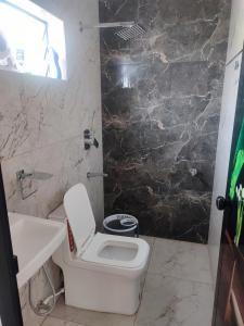 Koupelna v ubytování Alam Homestay