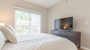 Ліжко або ліжка в номері Landing Modern Apartment with Amazing Amenities (ID7440X15)