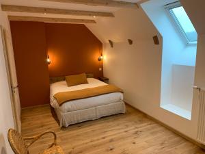 Säng eller sängar i ett rum på La Grange De L’Abille