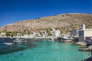a group of boats in a body of water at Hellas Palace ROOMS LOFT in Sparta