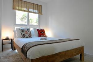 Ένα ή περισσότερα κρεβάτια σε δωμάτιο στο Large appartement with great views
