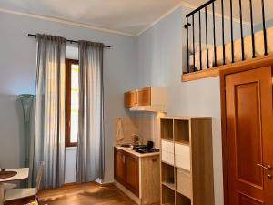 A kitchen or kitchenette at MoonLight Suite