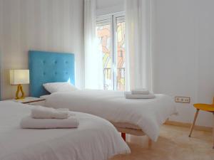 Posteľ alebo postele v izbe v ubytovaní Fantástico apartamento de dos dormitorios en el Soho