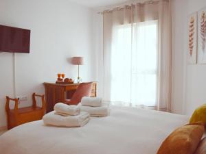 Posteľ alebo postele v izbe v ubytovaní Fantástico apartamento de dos dormitorios en el Soho