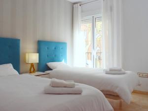 Posteľ alebo postele v izbe v ubytovaní Fantástico apartamento de dos dormitorios en el Soho