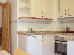 Kuchyňa alebo kuchynka v ubytovaní Fantástico apartamento de dos dormitorios en el Soho