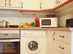 Kuchyňa alebo kuchynka v ubytovaní Fantástico apartamento de dos dormitorios en el Soho