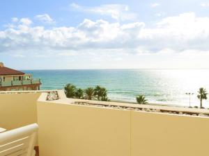 a view of the ocean from the balcony of a resort at Magnífico ático frente al mar en Ricón de la Victoria in Rincón de la Victoria